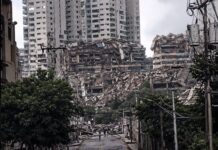 Simbol upanja po potresu in več kot 1400 mrtvih v Venezueli: 11-letni deček iz ruševin, pogrešanih še vedno več kot 50.000 ljudi #video