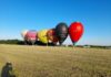 Spektakel balonov nad Soboškim jezerom očara množice #foto