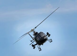 Delovna nesreča v gozdu pri Pristavi: Poškodovanega odpeljal vojaški helikopter